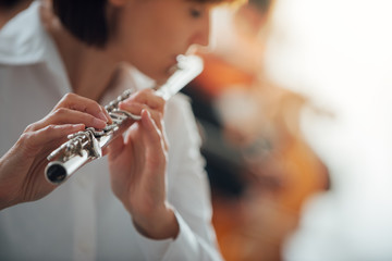 Professional flute player performing