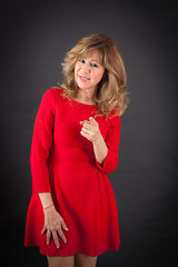 Fototapeta premium Beautiful woman doing different expressions in different sets of clothes: suspicion