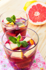 Refreshing summer drink with lots of different fruits
