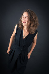 Fototapeta premium Beautiful woman doing different expressions in different sets of clothes: blinking