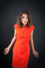 Fototapeta premium Beautiful woman doing different expressions in different sets of clothes: sur^rise