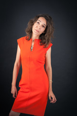 Fototapeta premium Beautiful woman doing different expressions in different sets of clothes: bored