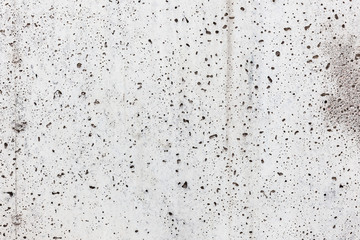 Holey concrete wall background - 89636184