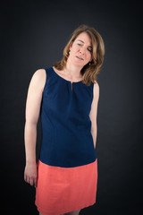 Beautiful woman doing different expressions in different sets of clothes: bored