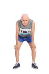 Exhausted senior runner on white background