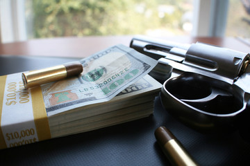 Guns and money stock photo