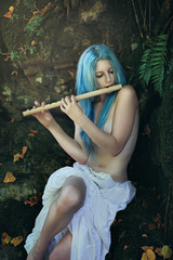 Forest maiden playing flute © captblack76