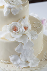 white wedding cake with decoratio