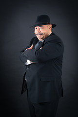 Handsome man doing different expressions in different sets of clothes: arms crossed