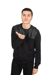 Fototapeta premium Handsome man doing different expressions in different sets of clothes: kiss