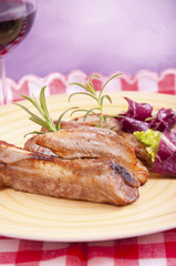 Pork chops with fried sausages