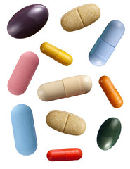 Assorted pills and capsules isolated on white