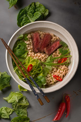 A bowl of Chinese ramen noodles with beef, Chinese cabbage