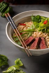 A bowl of Chinese ramen noodles with beef, Chinese cabbage