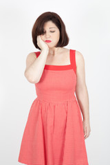 Beautiful woman doing different expressions in different sets of clothes: toothache