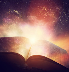 Open old book merged with magic galaxy sky, stars. Literature, horoscope