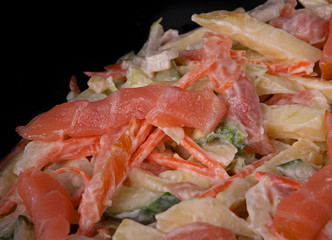 Salad with red fish and vegetable