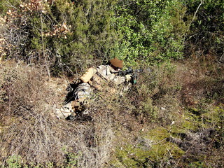 Soldier in camouflage airsoft sports