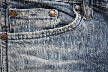 Close up blue jeans pocket.