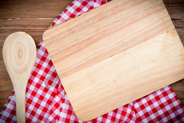 Blank wood Surface and wooden spoons, top view