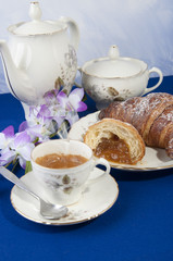 croissants with jam and coffee