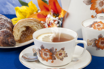 Tea with lemon croissant