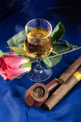 Fototapeta na wymiar Brandy with pipe and cigar