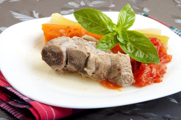 beef broth with a piece of veal