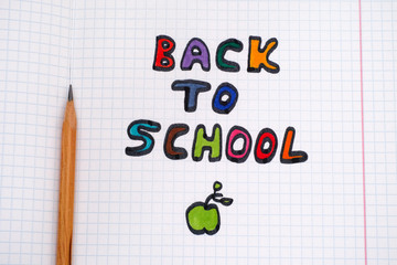Colorful Back To School phrase and pencil