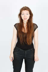 Beautiful businesswoman doing different expressions in different sets of clothes: good surprise