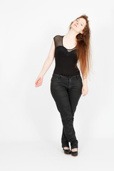 Beautiful businesswoman doing different expressions in different sets of clothes: posing