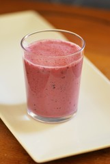 healthy pink smoothie in glass 