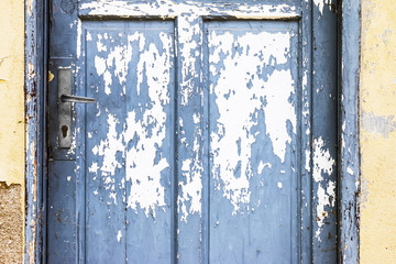Blue Door With Peeling Paint