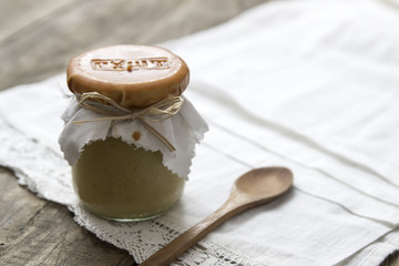 Tasty fresh hummus in jar