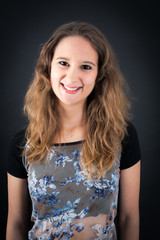 Beautiful woman doing different expressions in different sets of clothes: smile