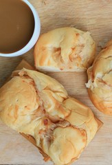 tasty coconut bread and hot coffee