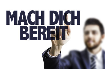 Business man pointing the text: Get Ready (in German)