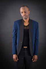 Fototapeta premium Handsome man doing different expressions in different sets of clothes: sad