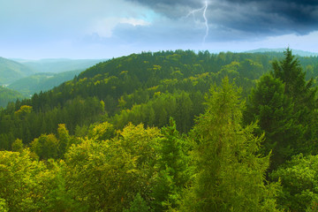 during a storm in the mountains lightning.