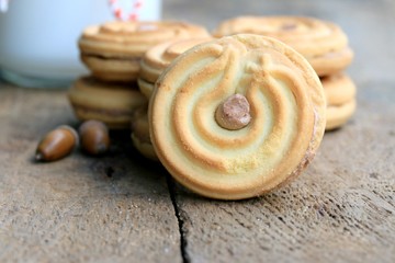 tasty cream cookies and milk