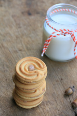 tasty cream cookies and milk