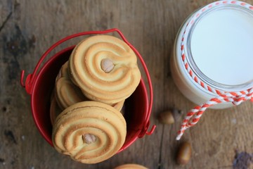tasty cream cookies and milk