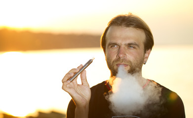 man with an electronic cigarette