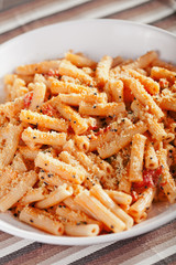 Penne with tomatos and parmesan cheese