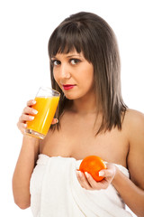 Young woman drinking orange juice