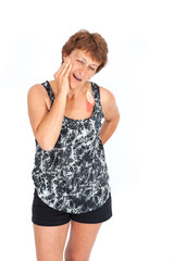 Beautiful woman doing different expressions in different sets of clothes: toothache