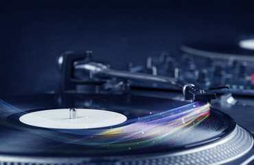 Music player playing vinyl music with colourful abstract lines