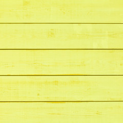 Vintage yellow wood plank as texture and background..