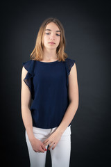 Beautiful woman doing different expressions in different sets of clothes: tired