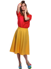 Beautiful woman with curly hair wearing a red jacket, isolated